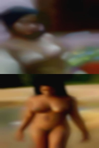 Ghetto naked BBW in people tank top.